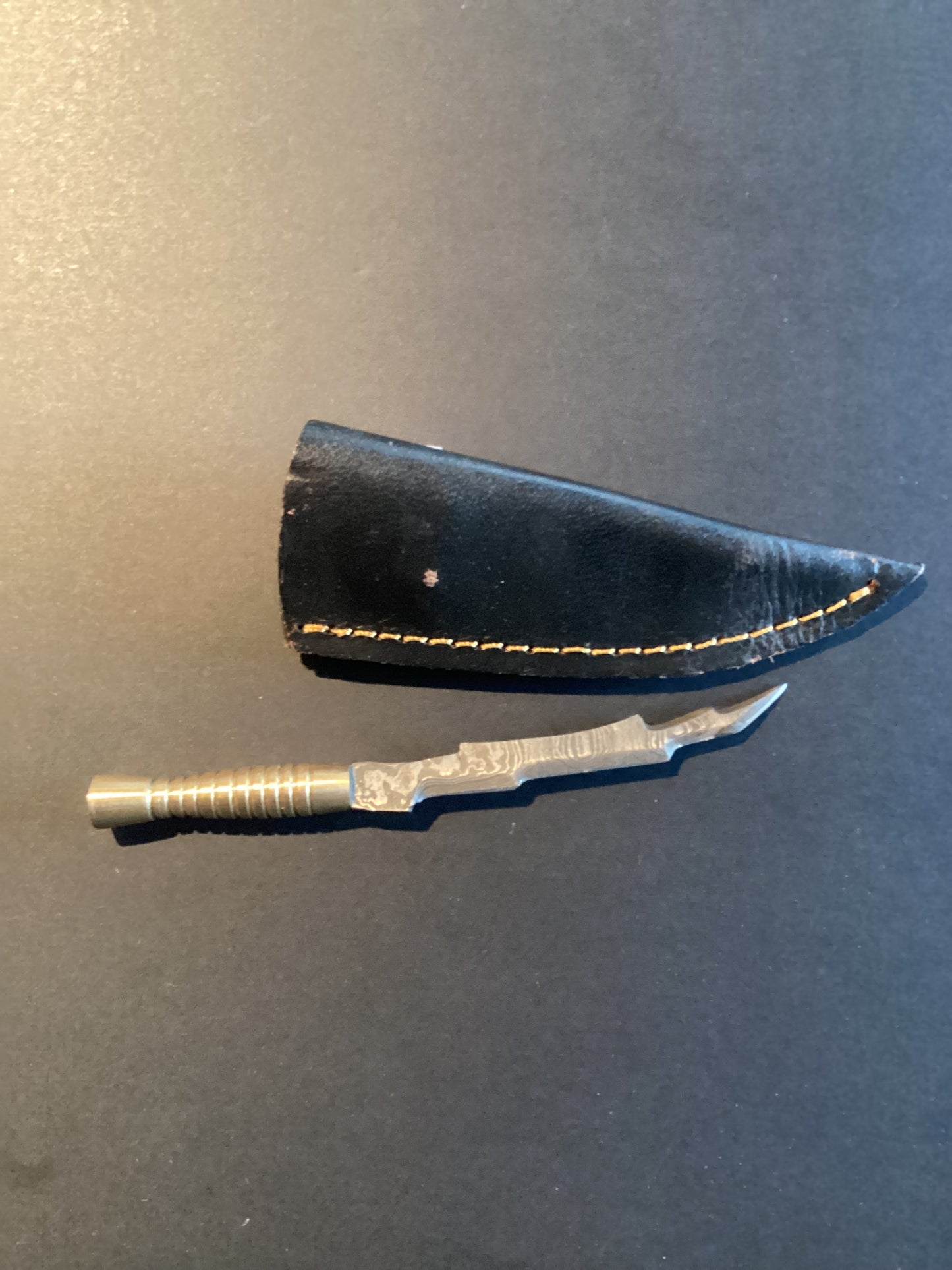 Damascus Dab Tool